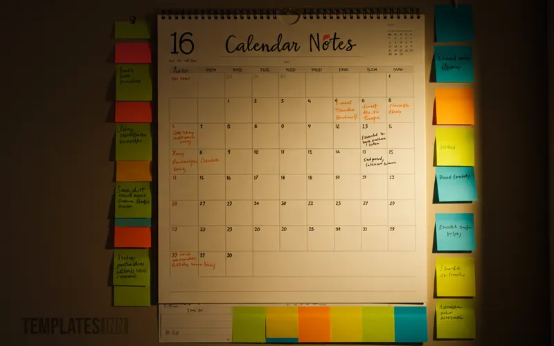 Wall calendar with important notes section and colorful sticky notes